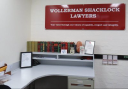 WOLLERMAN SHACKLOCK LEGAL SERVICES PTY. LTD. Logo