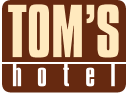 TOM S HOTEL Logo